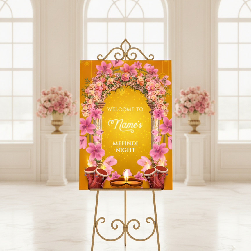 A decorative wedding sign for 'Name's Mehndi Night' displayed on a gold metal easel stand in a bright, classical hall with arched windows and pink floral arrangements.