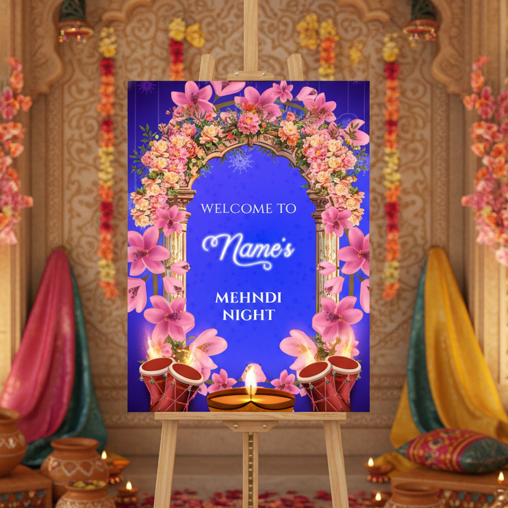 Decorative setup for a Mehndi night with floral arch and candles.