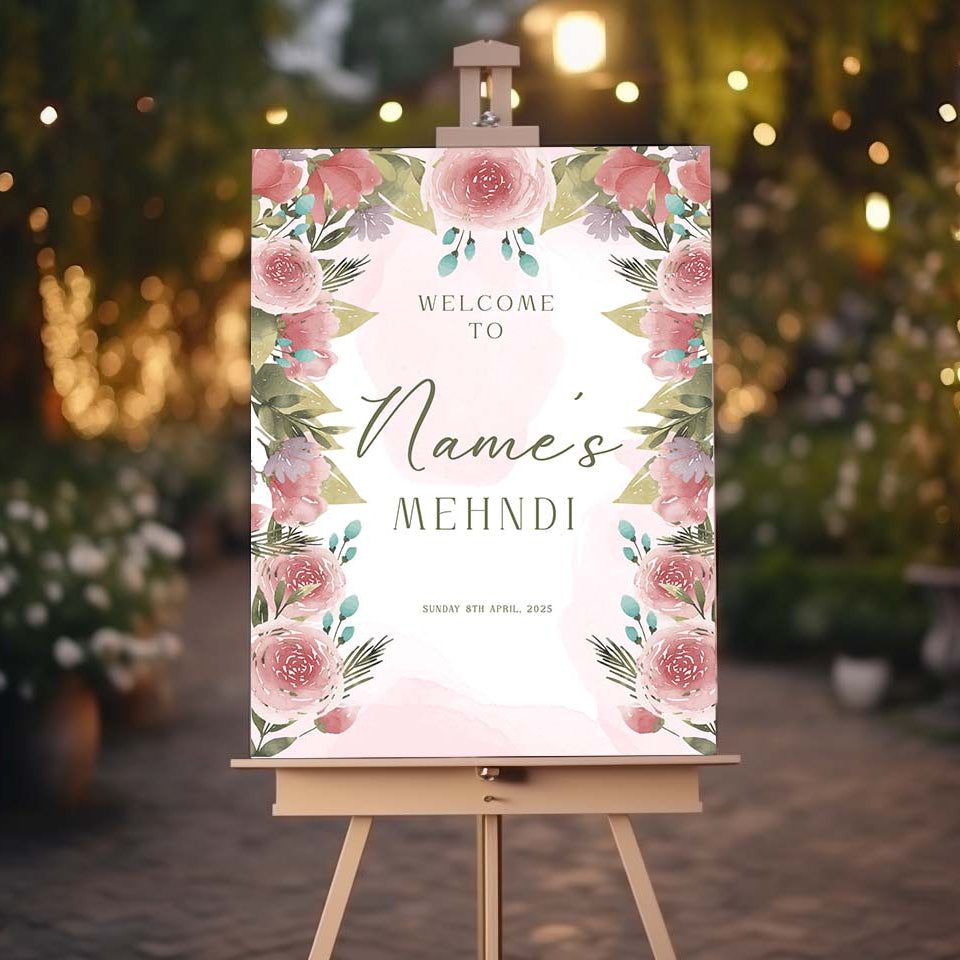 Floral-themed welcome sign on an easel with a blurred outdoor background